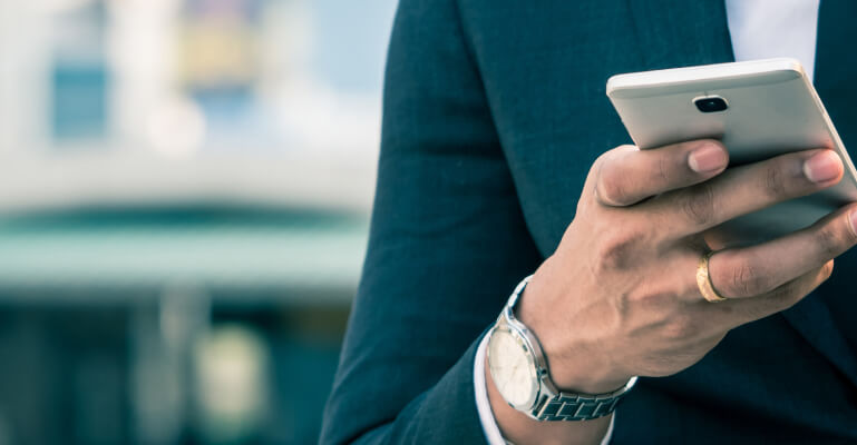 Person watching his phone
